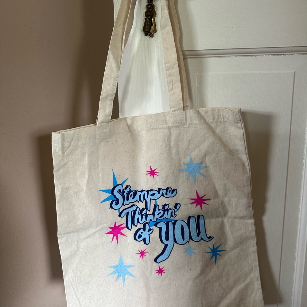 Stylish Cream Tote Bag with Blue and Pink Accents